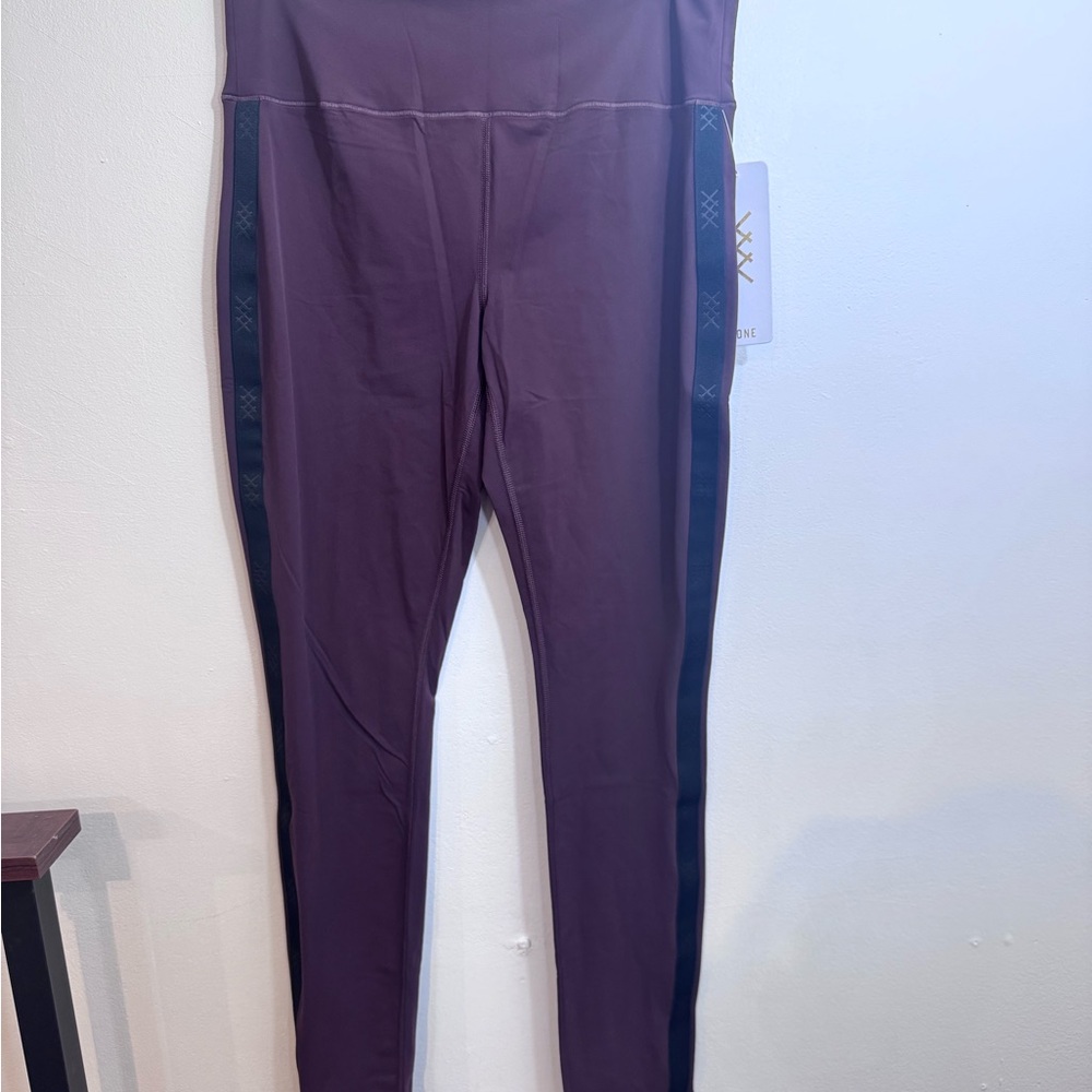 RHONE women’s Leggings in Deep Purple with Black Accents